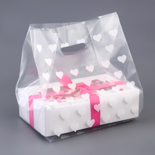 Пакет прозрачный с вырубной ручкой Сердечки, 25*35+16см Пакет прозрачный с вырубной ручкой Сердечки, 25*35+16см